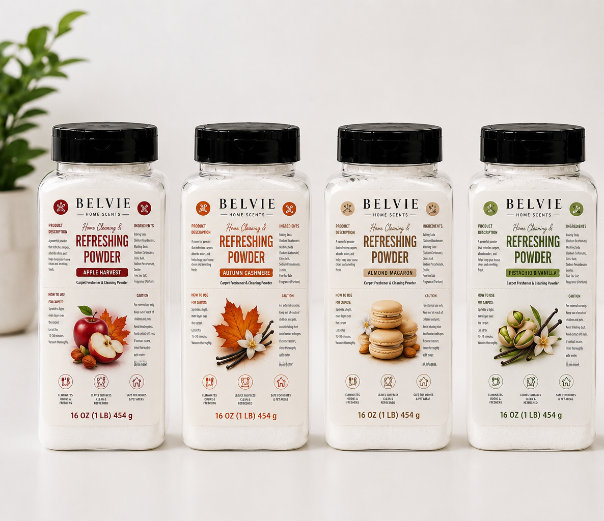 Five BELVIE Refreshing Powder bottles in different fall and citrus flavors, lined up on a white surface against a clean white background with soft decorative plants.